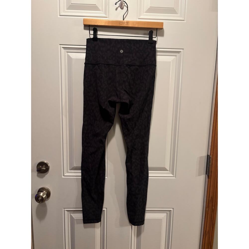 Lululemon Align High-Rise Leggings, likely in a black camouflage pattern size 6